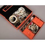 A jewellery case, well filled with vintage costume jewellery.