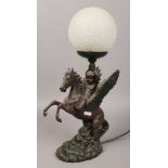 A composite table lamp formed as Pegasus winged horse with crackle glass shade.