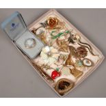 A collection of costume brooches to include cased Wedgwood cameo example.