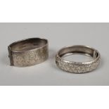 A silver bangle assayed Birmingham 1948 along with another similar.