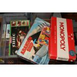 A box of board games to include Monopoly, Cluedo etc.