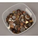 A tin of mainly British pre decimal coins.