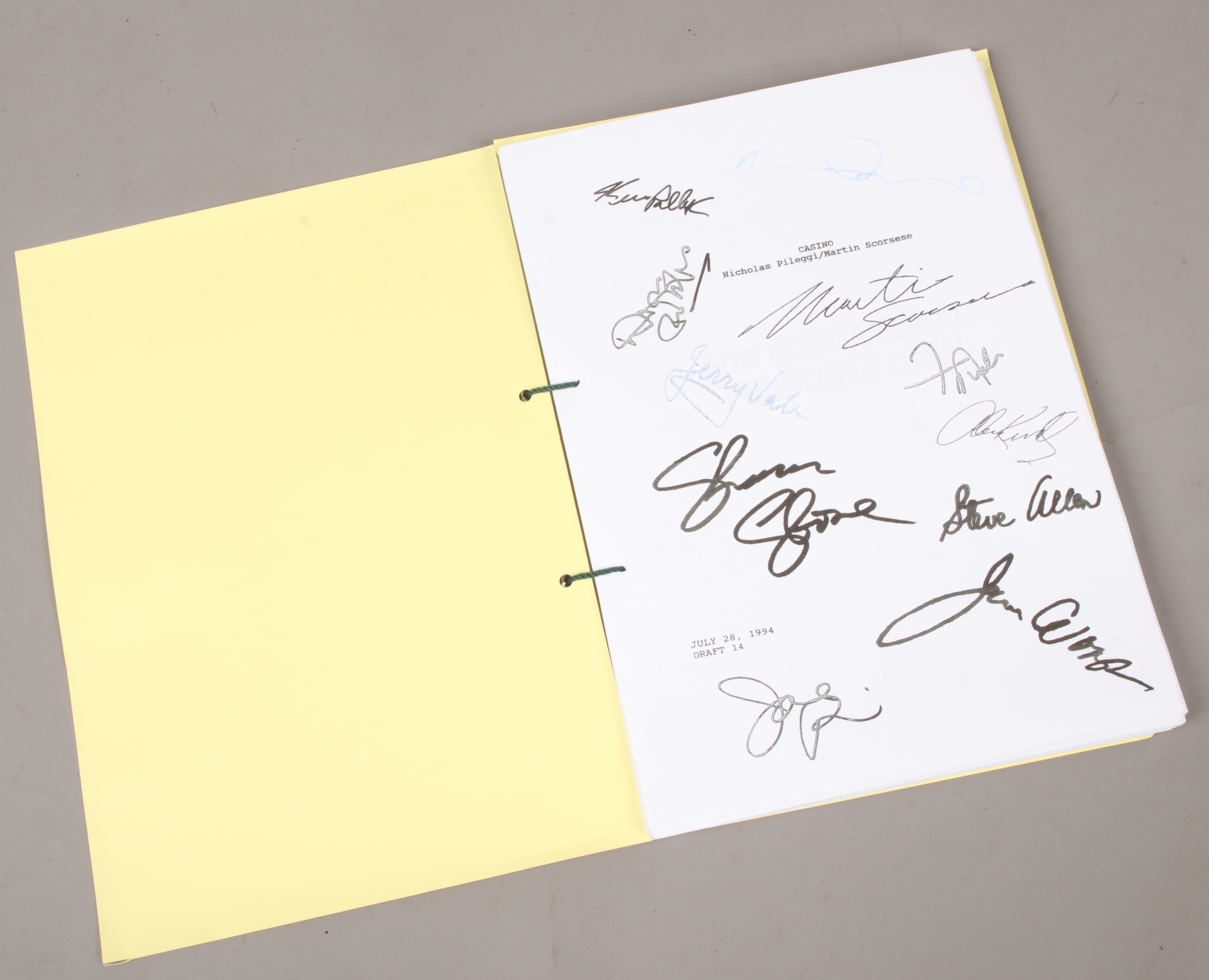 A reprint script of the film Casino with printed signatures.
