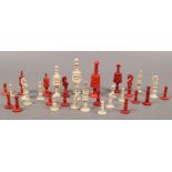 A complete bone chess set.Condition report intended as a guide only.Some damage.