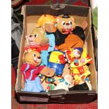 A box of children's toys including Noddy vehicles, along with four novelty hand puppets.