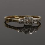 An 18ct gold and platinum Art Deco three stone diamond ring,m size O1/2.