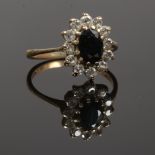 A 9ct gold sapphire and diamond halo cluster ring, size L.