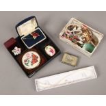 Two small boxes of costume jewellery to include silver examples simulated pearls, brooches etc.