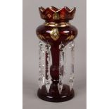 A Victorian ruby glass lustre with gilt decoration 10cm.Condition report intended as a guide only.