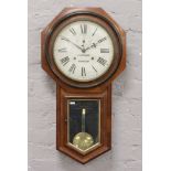 An Ansonia Clock Company mahogany drop dial wall clock A. Stinson Worksop to dial.