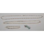 Two silver necklaces, along with a silver bracelet and a white metal enamel and marcasite sea