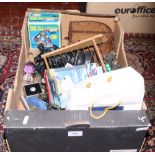 A box of collectables including boxed clockwork seal, abacus and boxed Oxford concord etc.