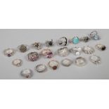 Twenty one assorted silver dress rings marked 925 including gem set examples.