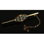 An Edwardian 15ct gold aquamarine and pearl openwork bar brooch. (3.65g)