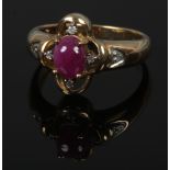 A 9ct gold cabochon, ruby and diamond ring, size O.