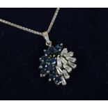 A vintage 18ct white gold sapphire pendant on chain.