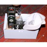 A quantity of Jack Daniels No. 7 Whisky collectables including empty bottles, advertising tins, mesh