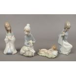 Four Lladro figures two of shepherd boys, one of a girl and one of a baby.Condition report