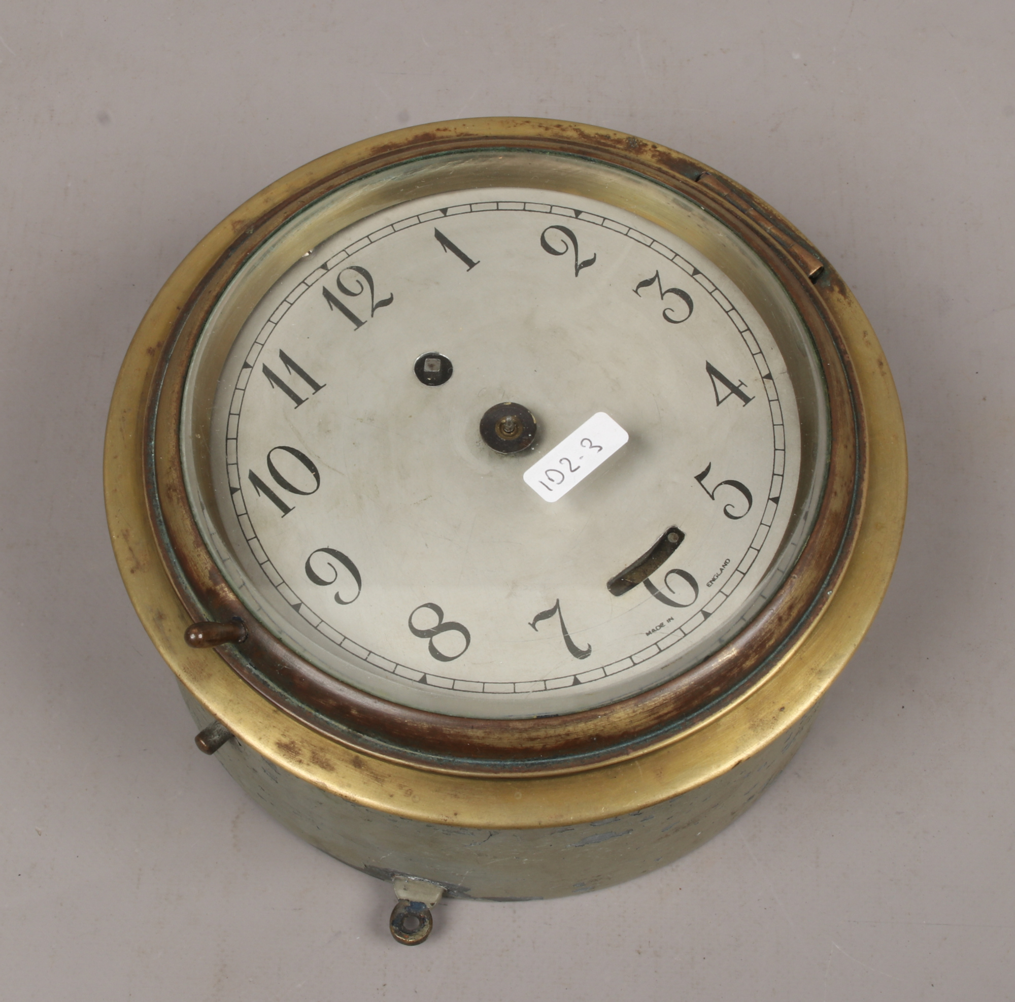 A brass and galvanised steel cased ships clock with French movement.Condition report intended as a - Image 2 of 2