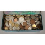 A vintage thrift coin box and contents of pre-decimal coins.