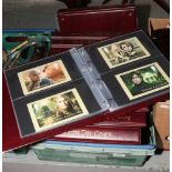 A box of eleven Royal mail albums and contents of first day covers, world stamps and Royal Mail