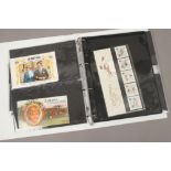 An album of presentation packs / Mint stamps to include commemorative, Christmas, famous people