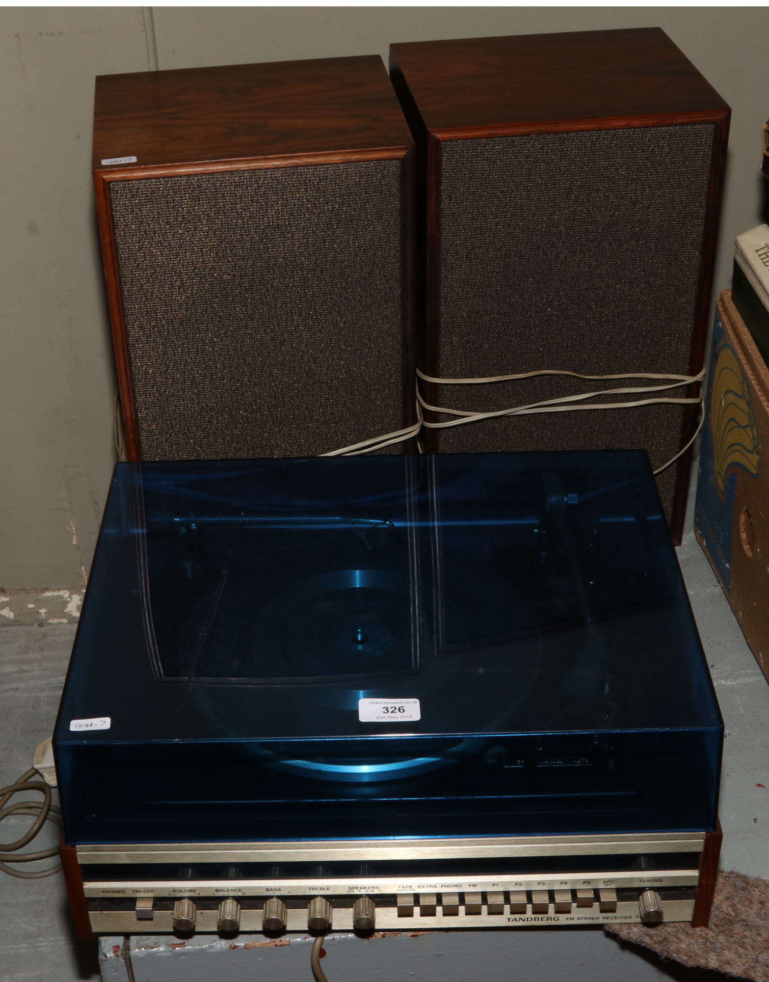 A Tandberg FM stereo receiver TR-200 with Garrard turntable, along with a pair of matching