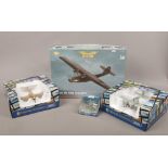 Four boxed Diecast metal model aircraft including P - 51 Mustang PBY - 5 Catalina 'black cat' from