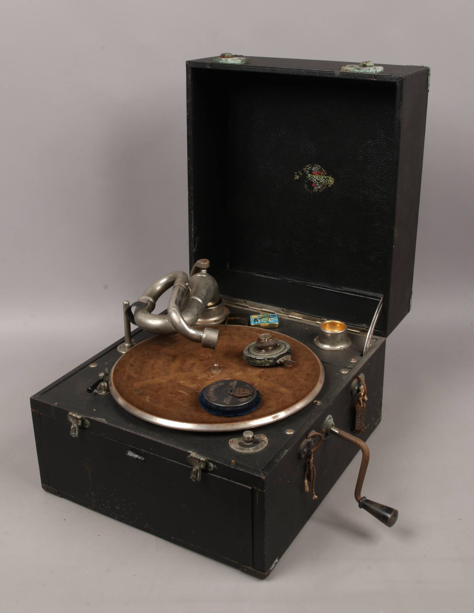 A Gilbert wind up portable gramophone.