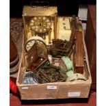A box of clocks and clock parts to include brass and glass Koma torsion clock, Swiza, Smiths,