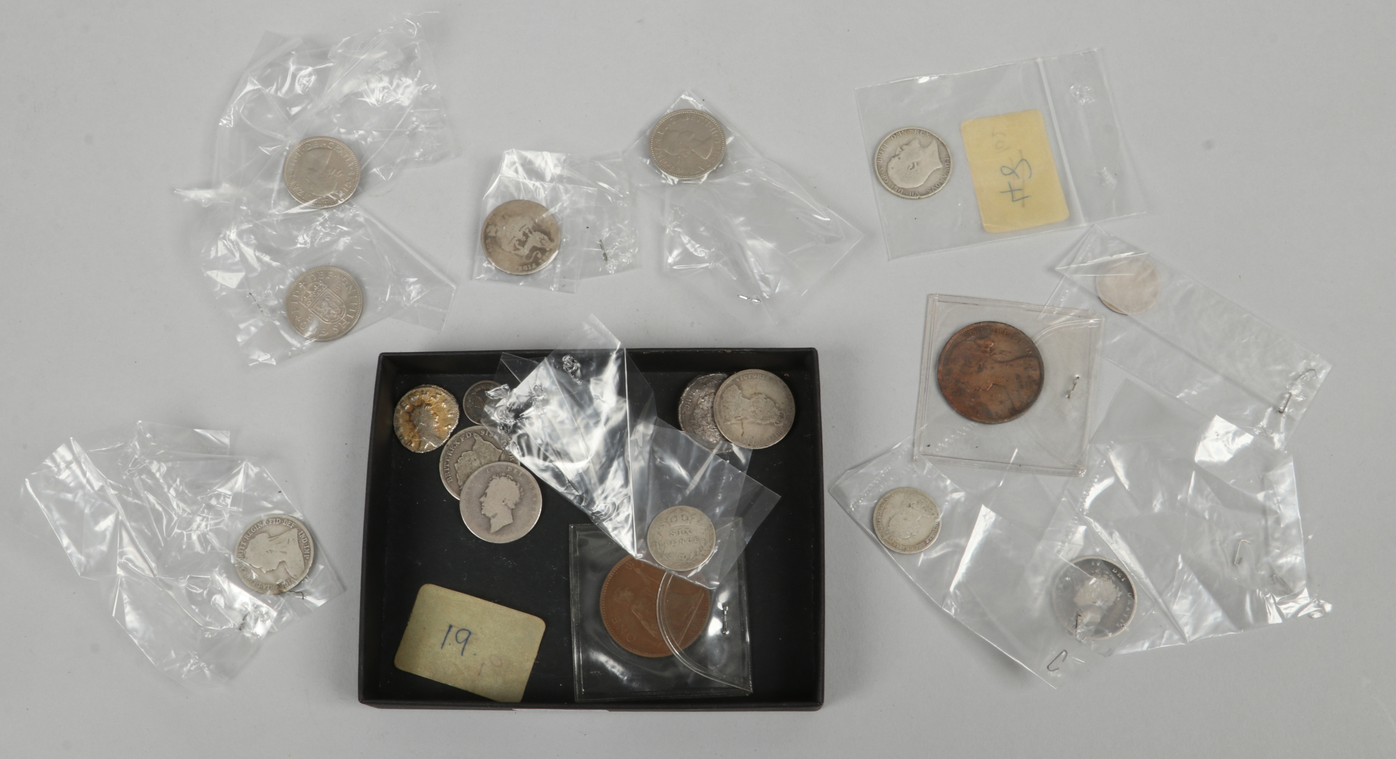 A collection of British pre-decimal coins to include Georgian and silver examples.