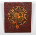 A Wooden and decal plaque bearing the arms of the North British Railway Company, 46cm x 41cm.