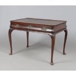 A George II mahogany bombe shaped silver table. With a single drawer, four candle slides and