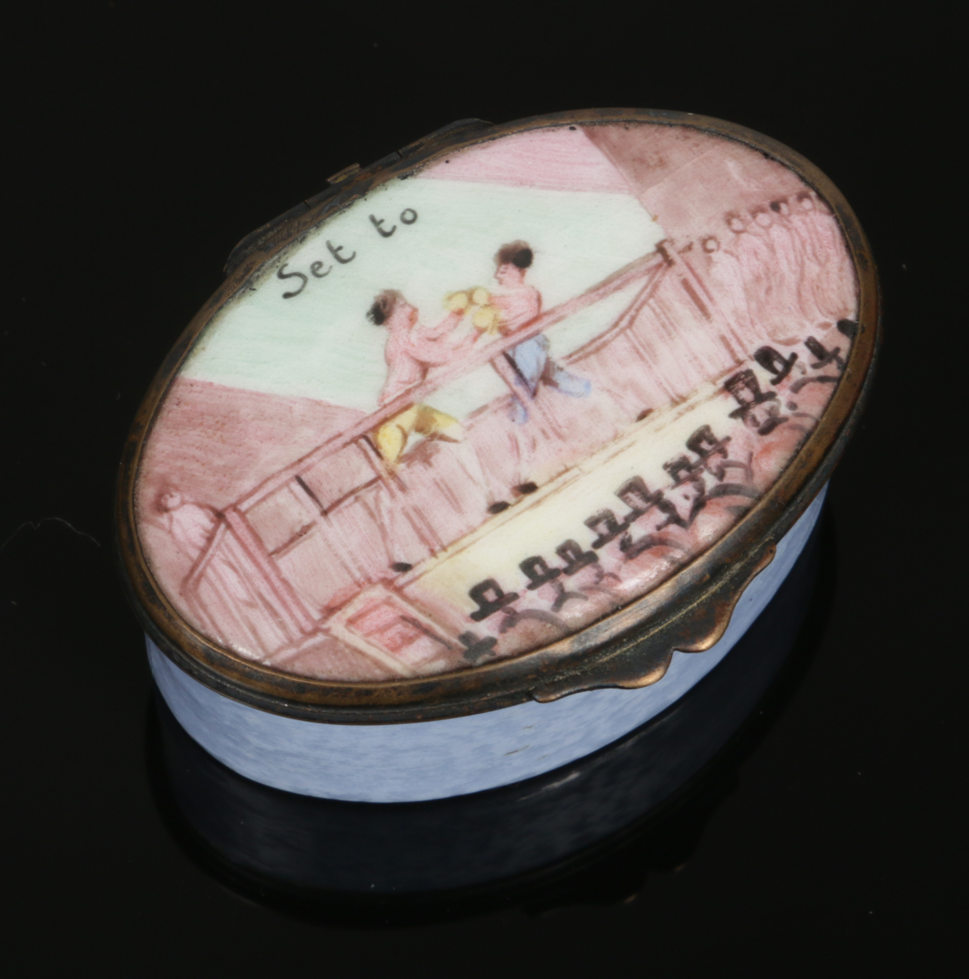 A late 18th / early 19th century Staffordshire enamel snuff box of oval form and with hinged
