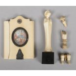 A 19th century ivory dance card set with a pair of silver framed miniature paintings. Along with