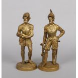 A pair of late 19th / early 20th century French gilt bronze figures formed as armoured soldiers