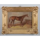 A 19th century gilt framed oil on board. Stable interior portrait of a rachorse. Inked label to