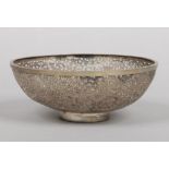 An early 20th century Chinese silver plated bowl. With pierced foliate decoration and with