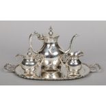 A Continental sterling silver coffee set on twin handled serving tray. Comprising coffee pot, milk