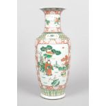 A large 19th century Chinese baluster famille verte vase. Red ground with chrysanthemums and