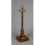 A 19th century French Empire ormolu mounted mahogany coat stand, 176cm high, base 53cm square.