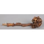 A 19th century large rootwood pipe with antler mouthpiece. Carved with a squirrel and a bust of a