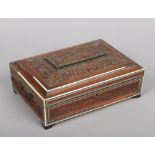 A 19th century Anglo Indian carved and inlaid fitted box of sarcophagus form and raised on bracket