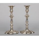 A pair of William IV silver table candlesticks by Waterhouse, Hodson & Co. With detachable