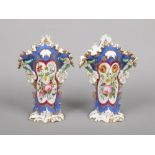 A pair of 19th century Jacob Petit mantel vases. Blue ground and enamelled with flowers, 30.5cm.