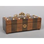 An early 20th century French walnut and olive wood parquetry jewellery casket. With gilt metal