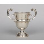 A George V silver twin handled trophy cup by James Dixon & Sons.  Assayed Sheffield 1926, 572 grams,