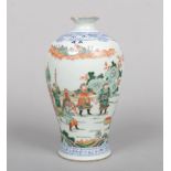 A Chinese famille verte meiping vase. Painted with an underglaze blue lambrequin collar and with a