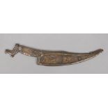 An antique Middle eastern bronze model of a sheathed dagger for ceremonial purposes. Decorated in