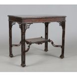 A Chinese Chippendale mahogany silver table. With blind fret carved frieze and raised on open fret